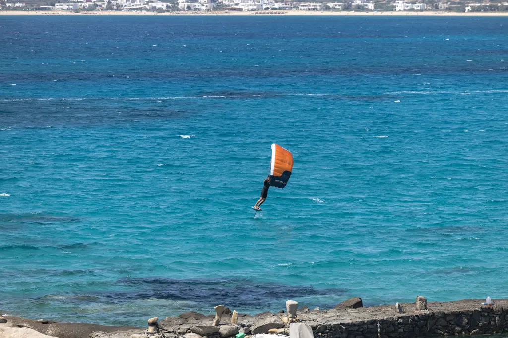Aerial view of riders on turquoise water