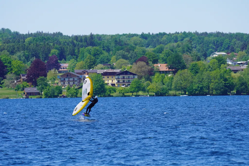 Wingfoil riders on the water