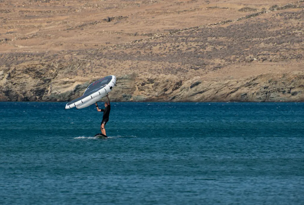 Kite rider performing a trick midair
