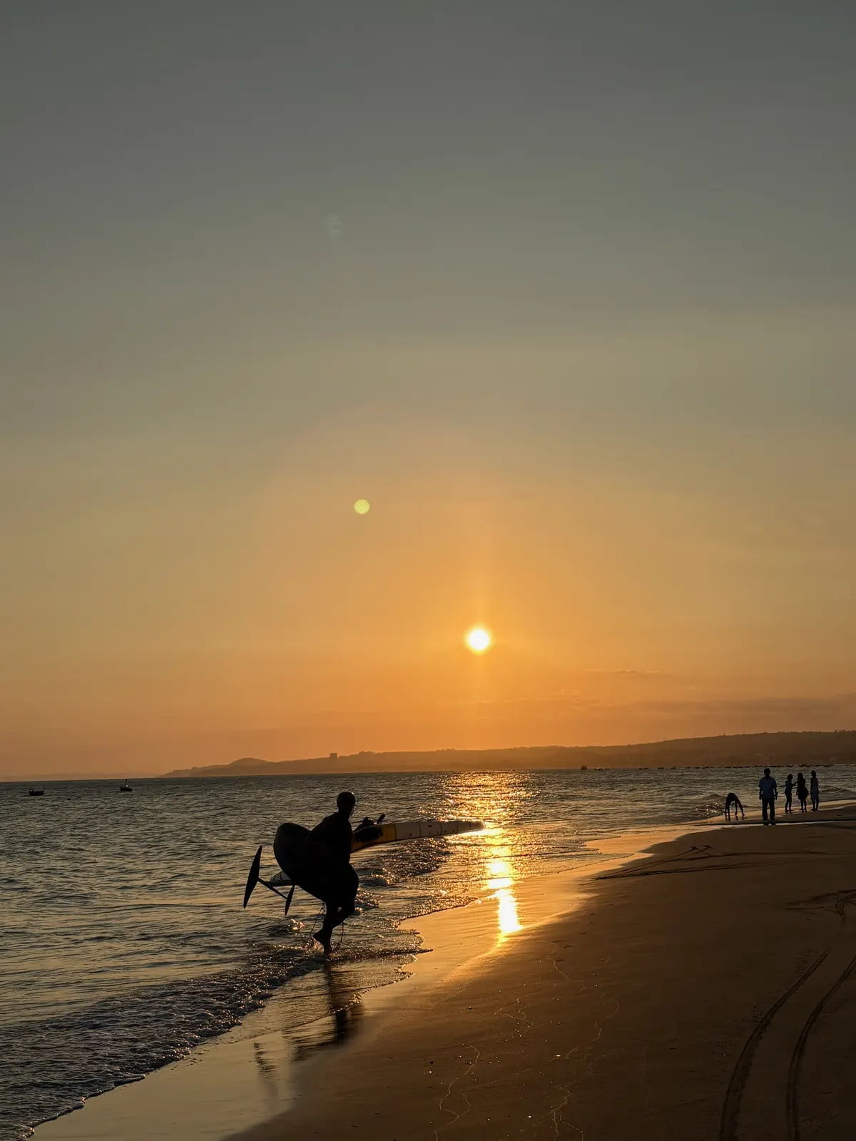 Sunset wingfoil session on the beach in Mui Ne, Vietnam